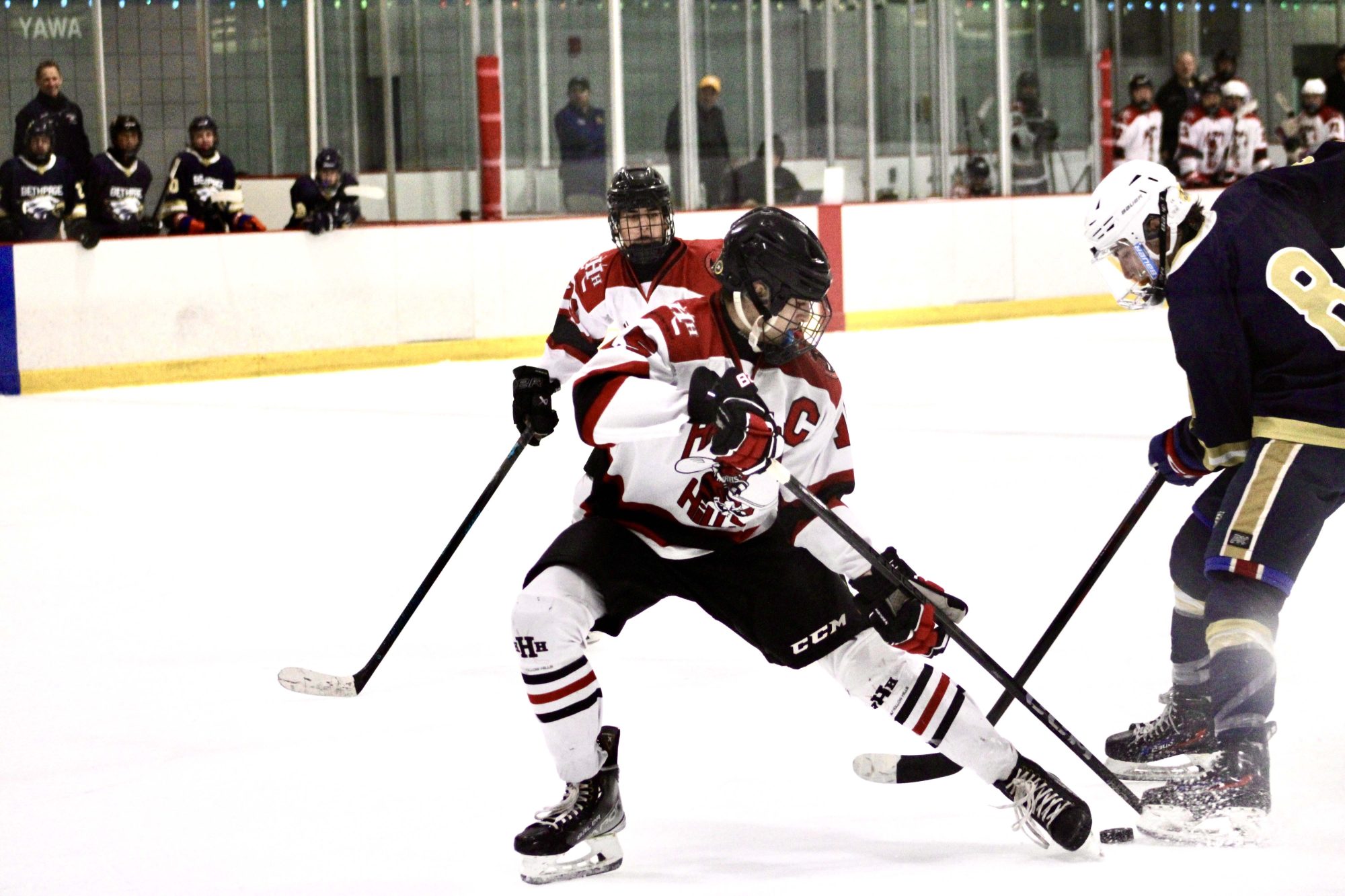 Ben Rachlin stealing a puck against the Knights
